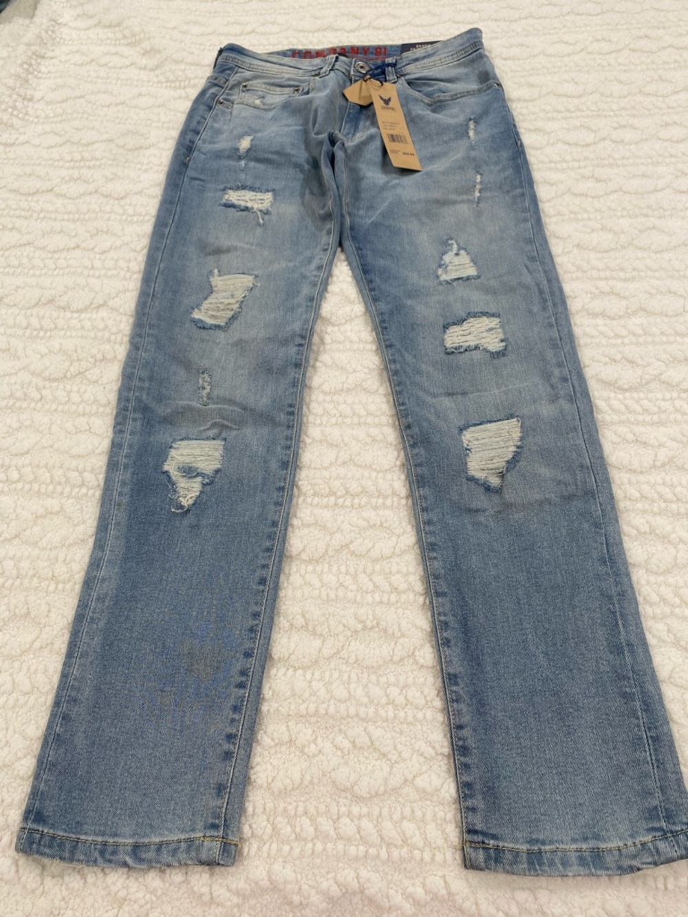Men's Distressed Light Blue Denim Jeans